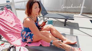 xsiteability.com - Carissa lying out in the sun gives herself a full-body suntan lotion rub down thumbnail